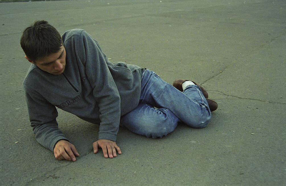 The artist posing as a mountain